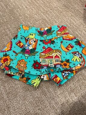 Kids Teal Floral & Icon Print Skort